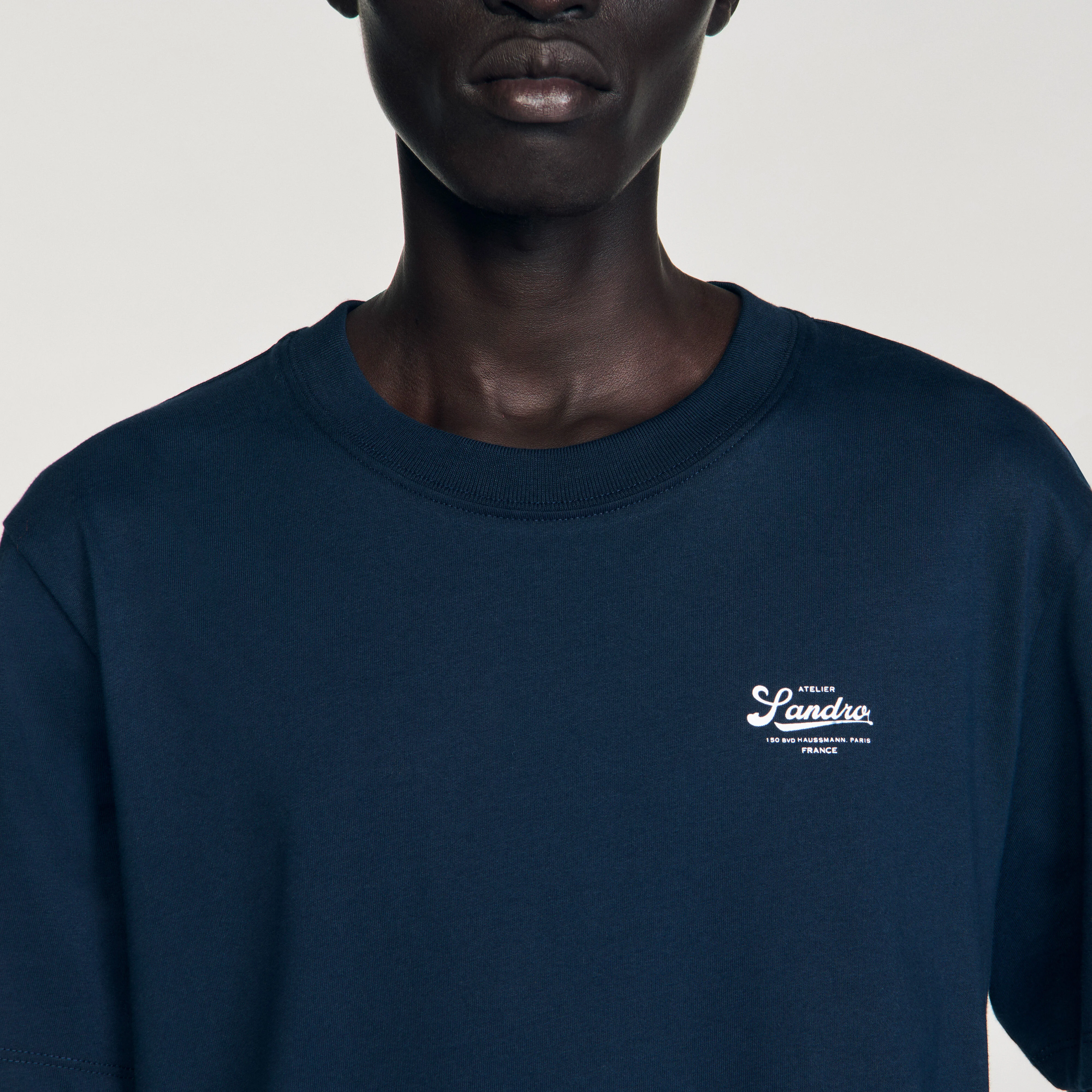 T-shirt with appliqué logo