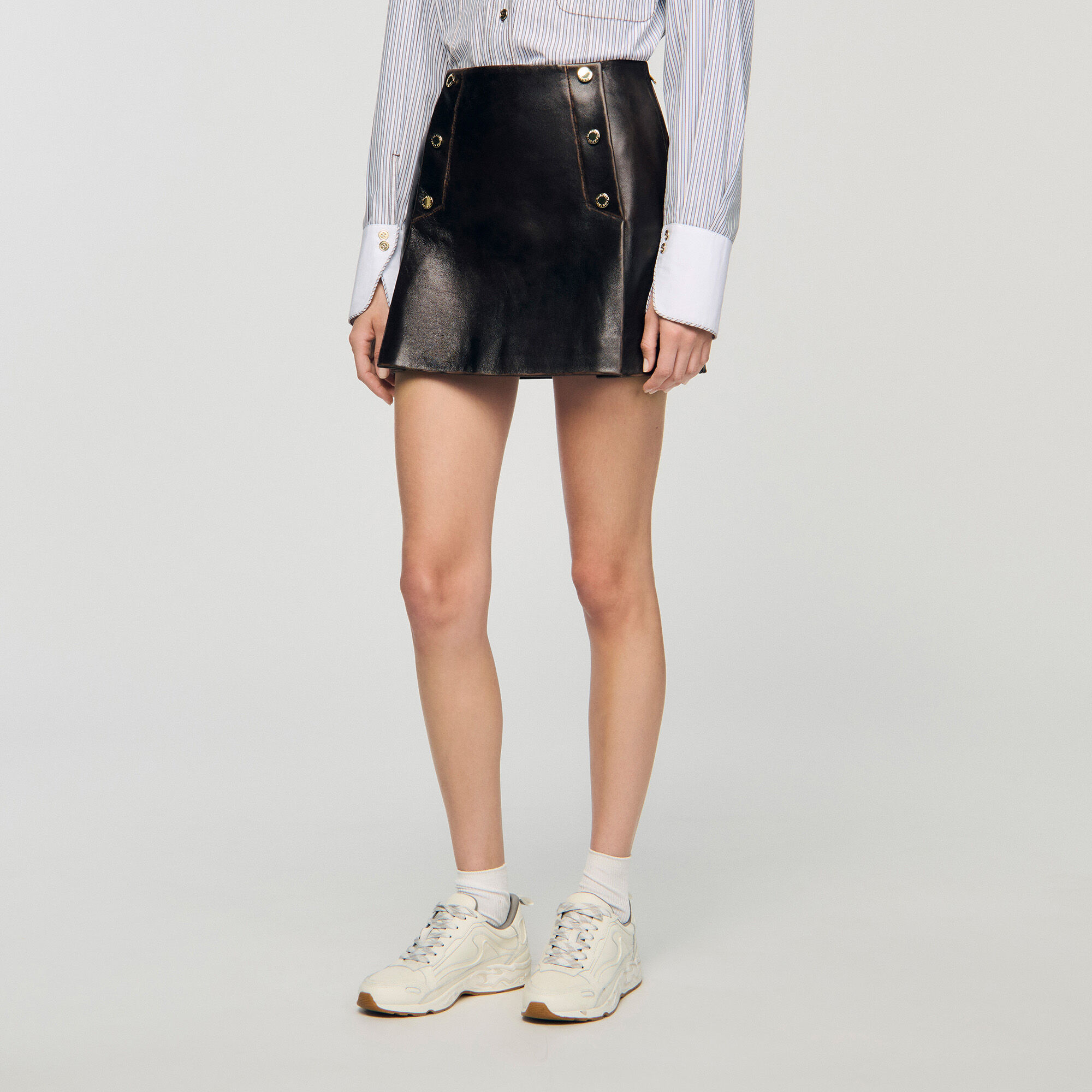 Mini aged leather skirt