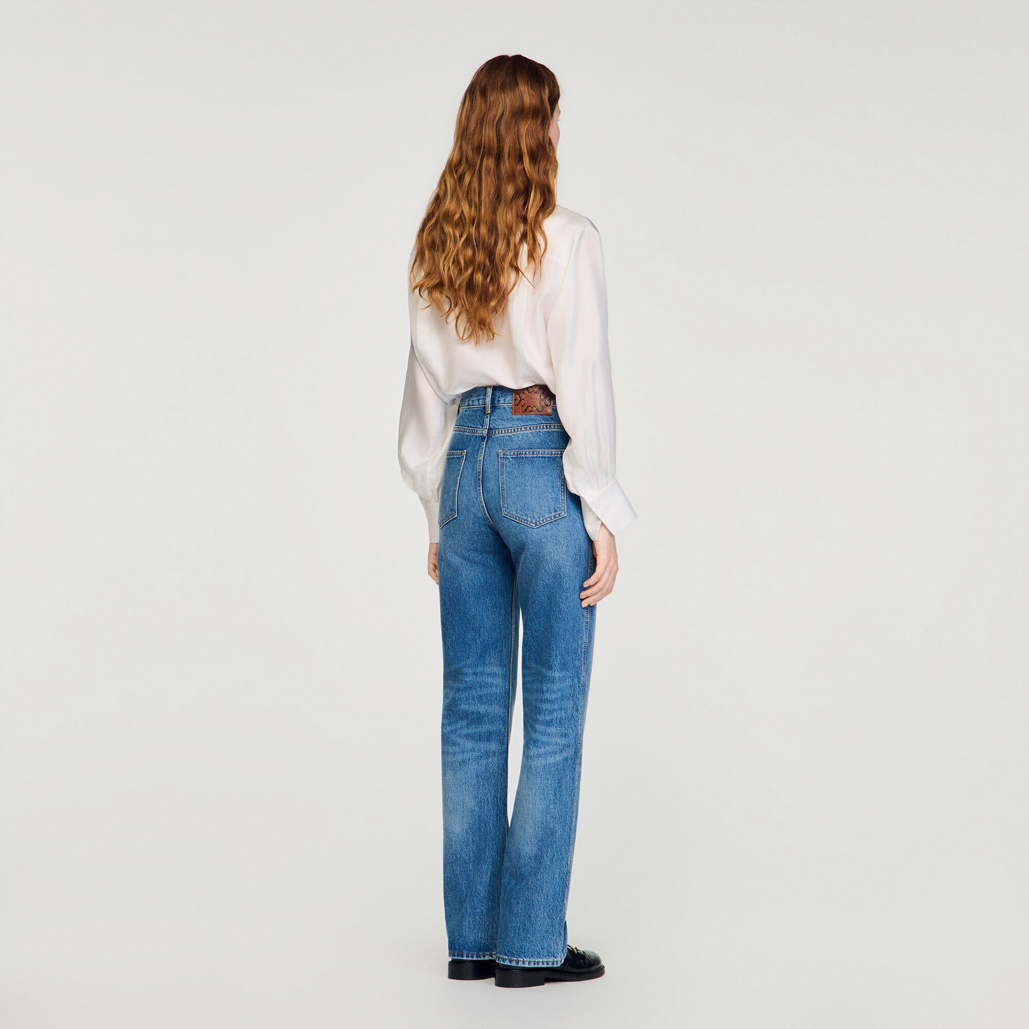 Flared faded jeans