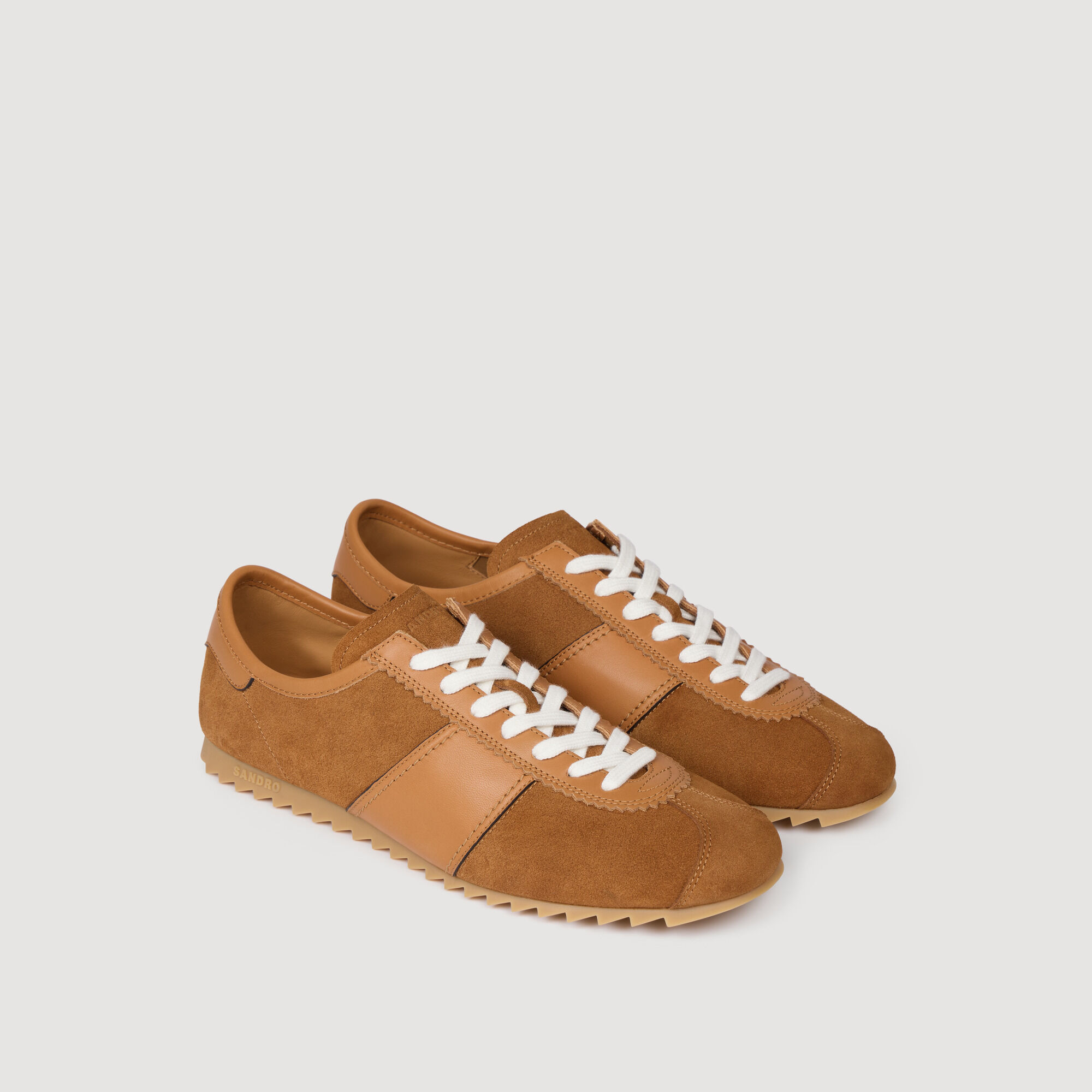 Leather and suede low-top sneaker