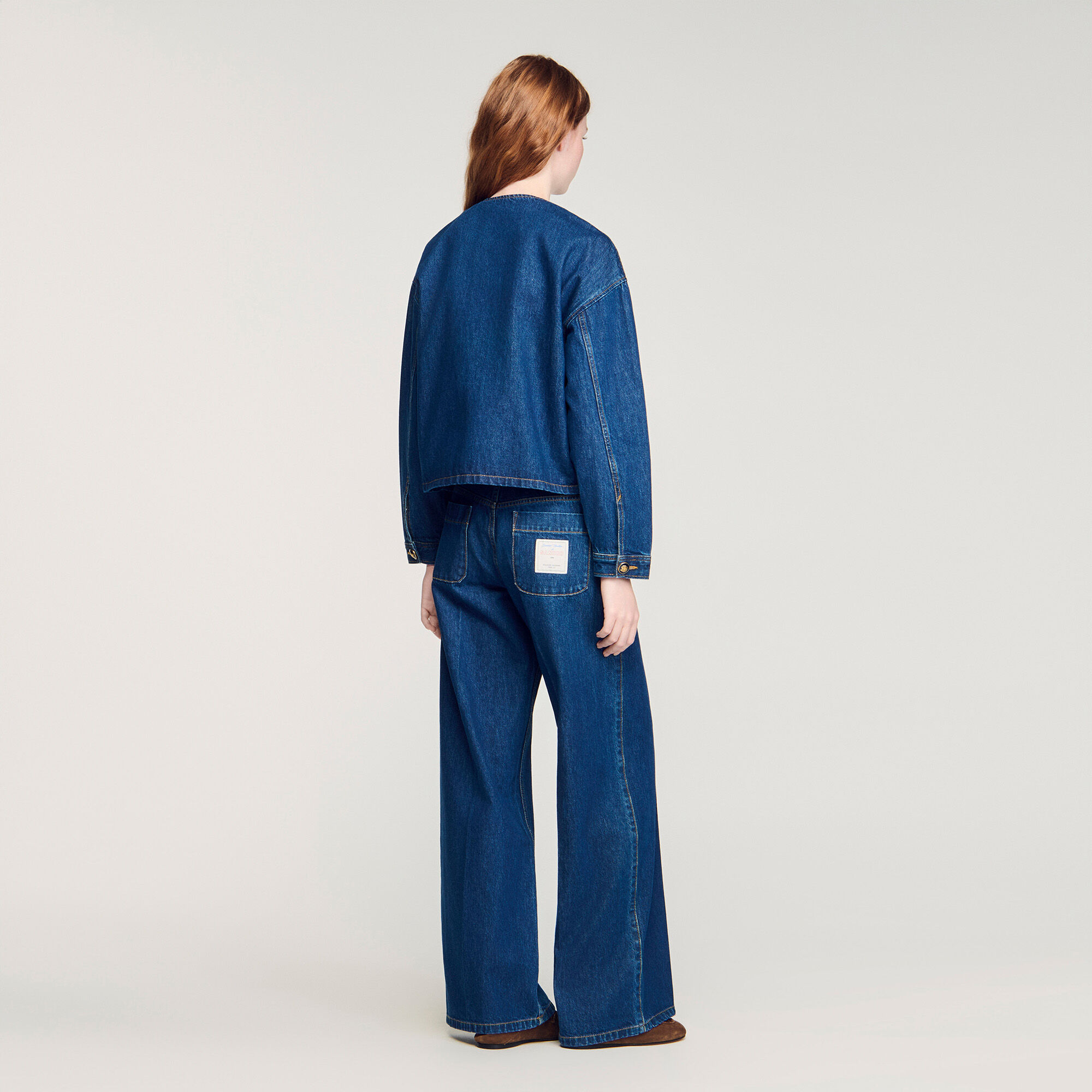 Denim jacket with fancy buttons