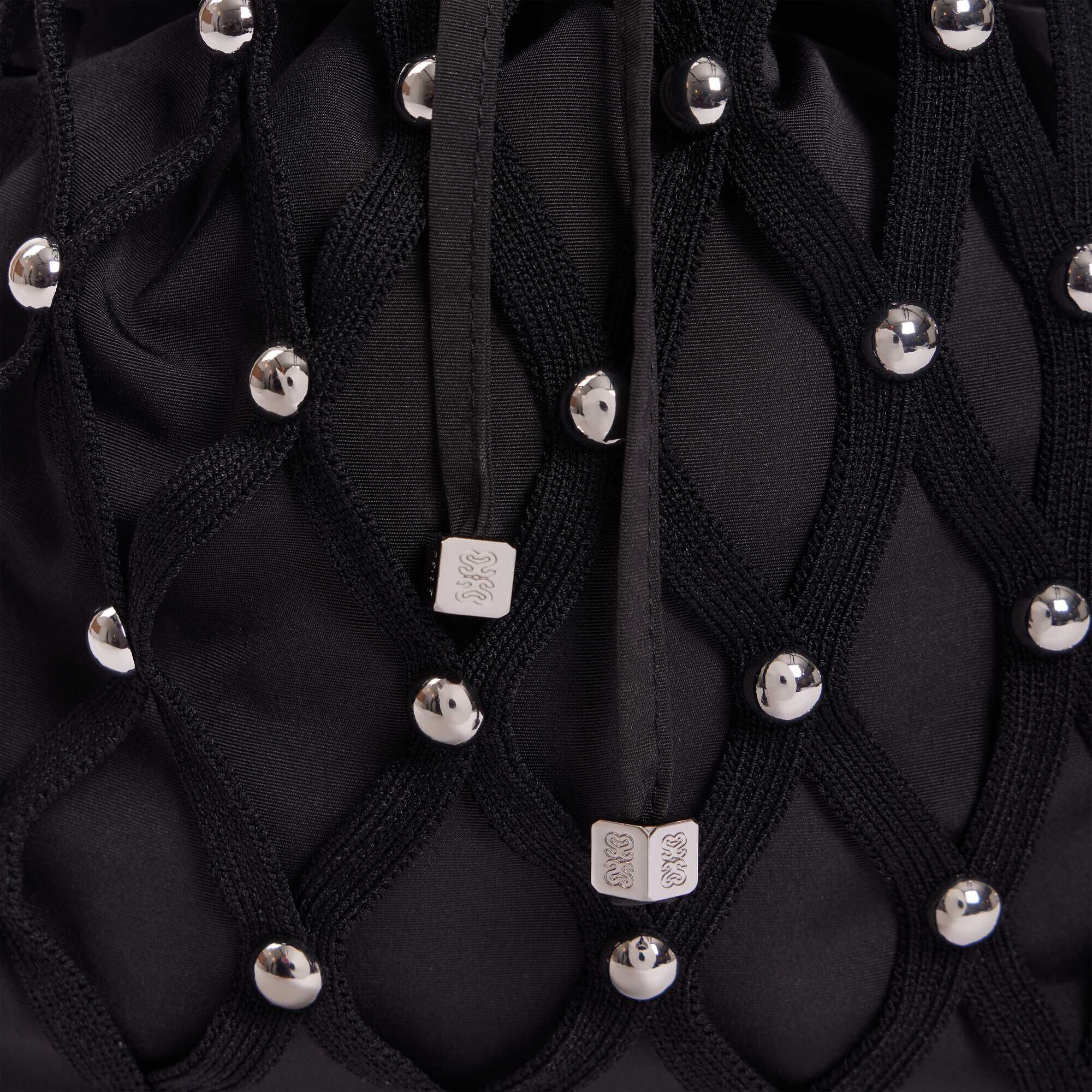 Studded net mesh bag