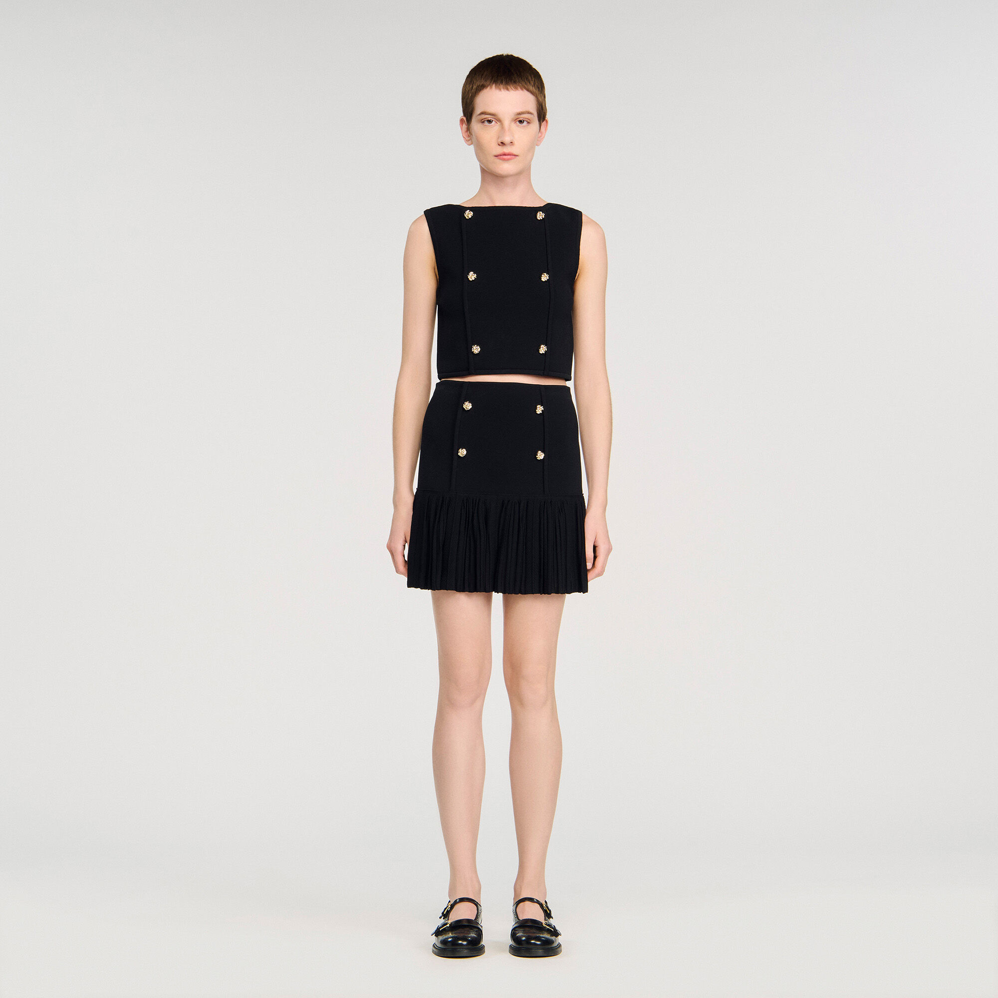 Mini pleated fine knit skirt