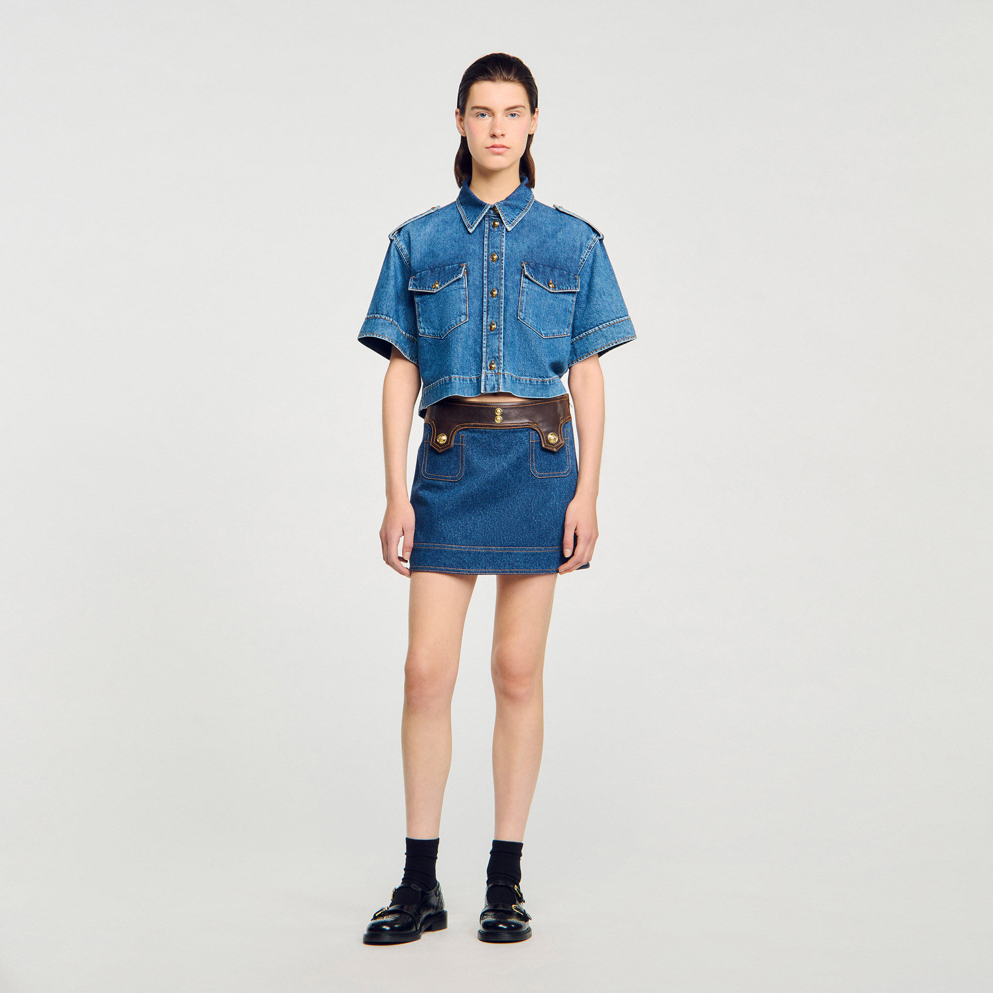 Mini denim and leather skirt